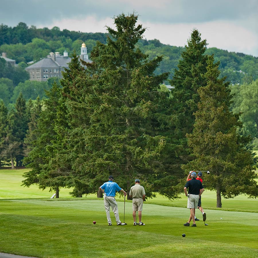 Four friends golf at Seven Oaks